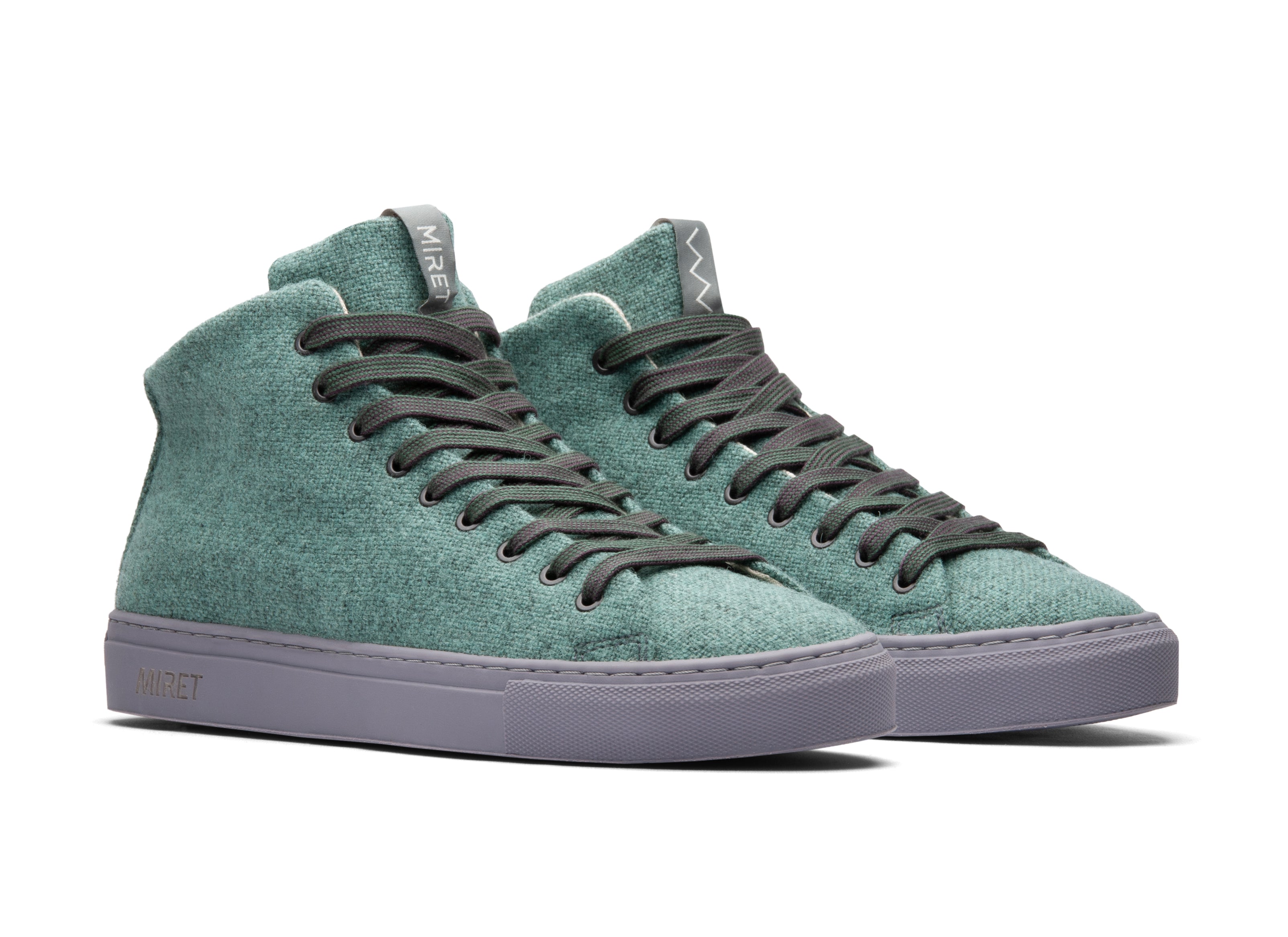 Mid-top natural sneakers for spring and summer in the color green. Made from 100% thermoregulating and water and dirt repellent wool with pure hemp lining, wool-covered cork insoles and natural rubber outsoles. OEKO-TEX certified sneakers manufactured in the EU.